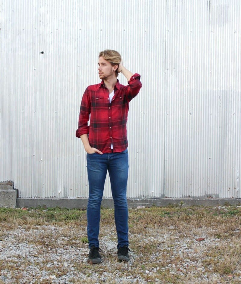 The Kentucky Gent in a Buffalo Plaid Shirt by JACHS, White V-Neck T-Shirt by BDG, Jeans by Topman, Black chucks by Converse.