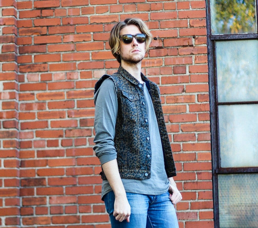 The Kentucky Gent in Ray-Ban Wayfarers, KR3W Long Sleeve Shirt, Kill City Leopard Print Denim Vest, WESC Jeans, Bed Stu Boots