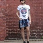 The Kentucky Gent in Obey Sugar Skull T-Shirt, Ray-Ban Wayfarers, Levi's Cut Off Shorts, Devil's Harvest Tie Hoodie From Urban Outfitters, and Converse Chucks.