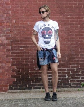 The Kentucky Gent in Obey Sugar Skull T-Shirt, Ray-Ban Wayfarers, Levi's Cut Off Shorts, Devil's Harvest Tie Hoodie From Urban Outfitters, and Converse Chucks.