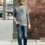 The Kentucky Gent, a Louisville, Kentucky men's life and style blogger, in Shop Local KY Weep No More My Lady Sweatshirt, Levi's Made and Crafted Denim, Converse Chuck Taylors, and Ray-Ban Aviator Sunglasses.