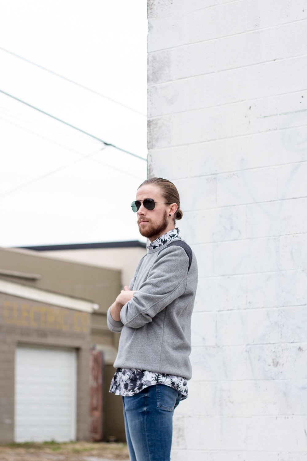 The Kentucky Gent, a Louisville, Kentucky men's life and style blogger, in Topman Floral Shirt, H&M Sweatshirt, H&M Skinny Jeans, Steve Madden Troopah Boots, and Ray-Ban Aviator Sunglasses.