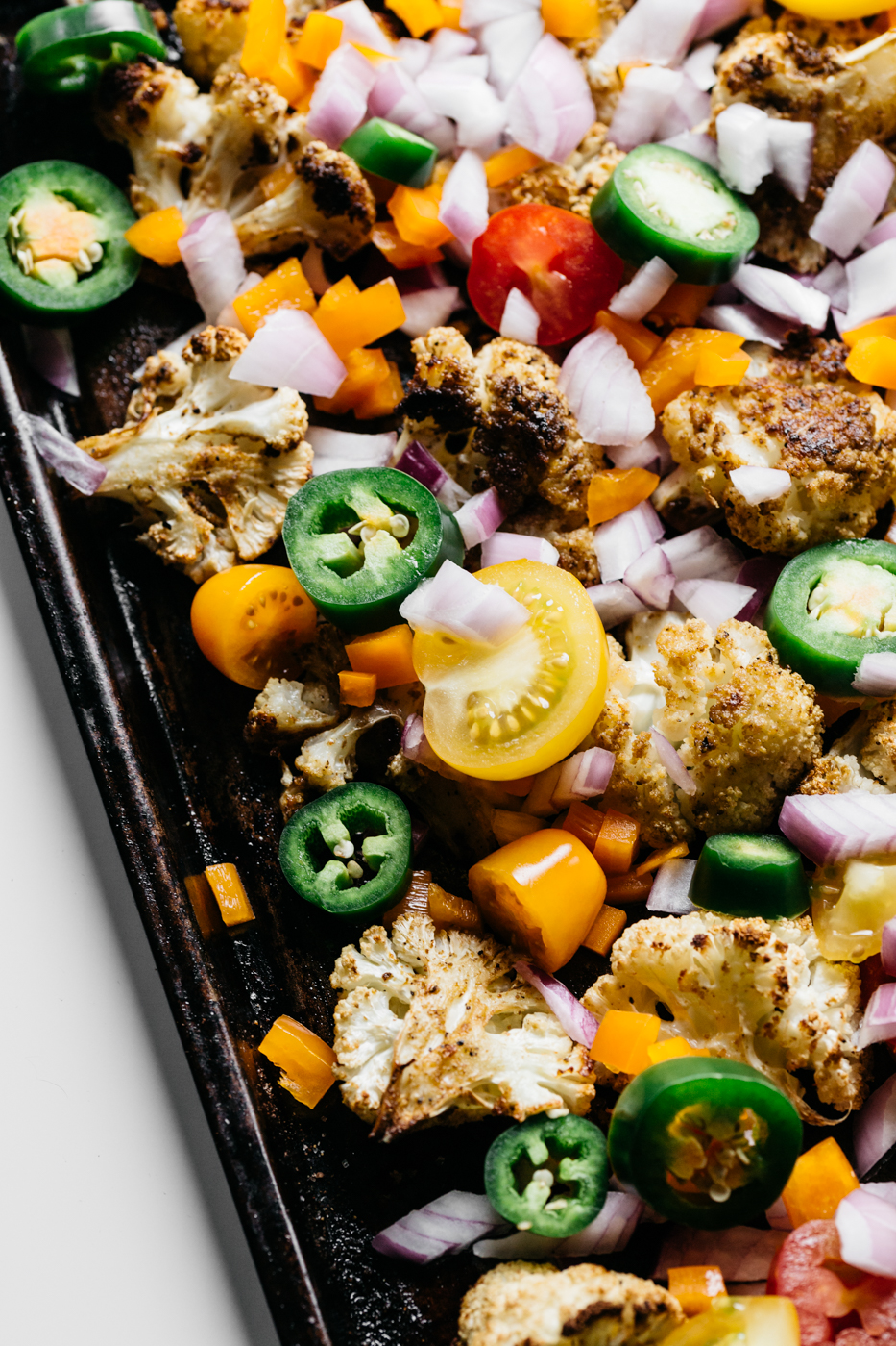 loaded cauliflower nachos, cauliflower nachos, low carb nachos, vegetarian appetizers, pride party food, rainbow food