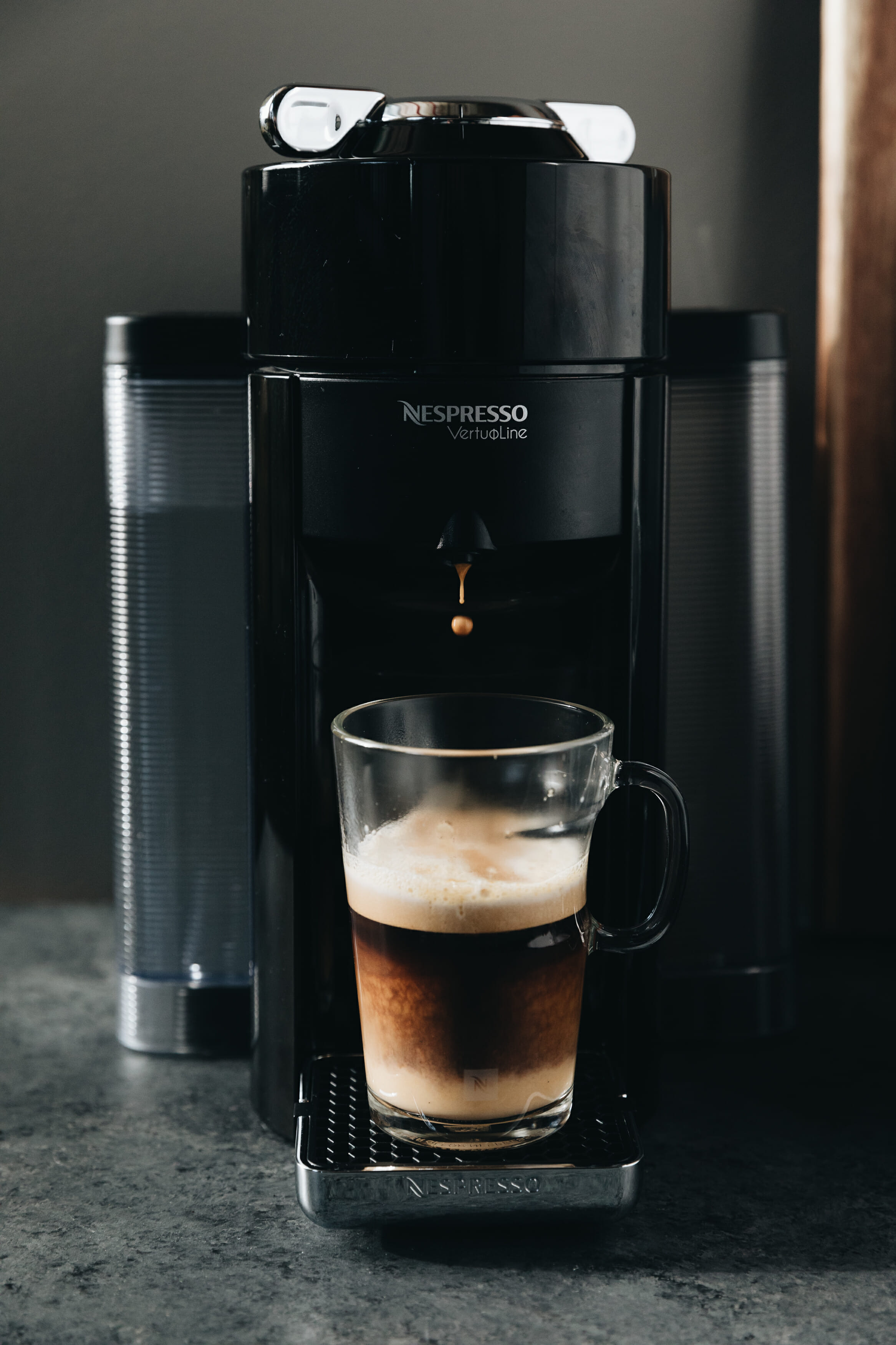 nespresso machine brewing coffee 