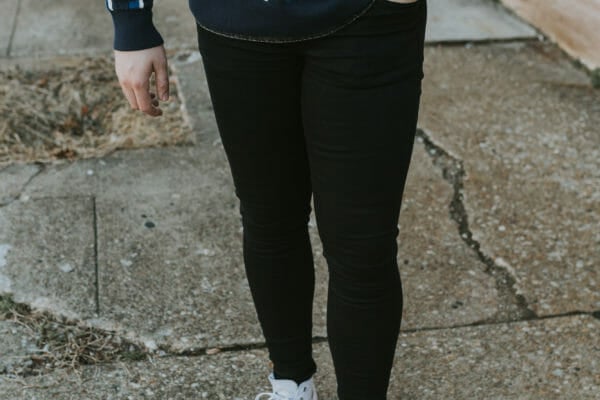 blue striped sweater with black jeans