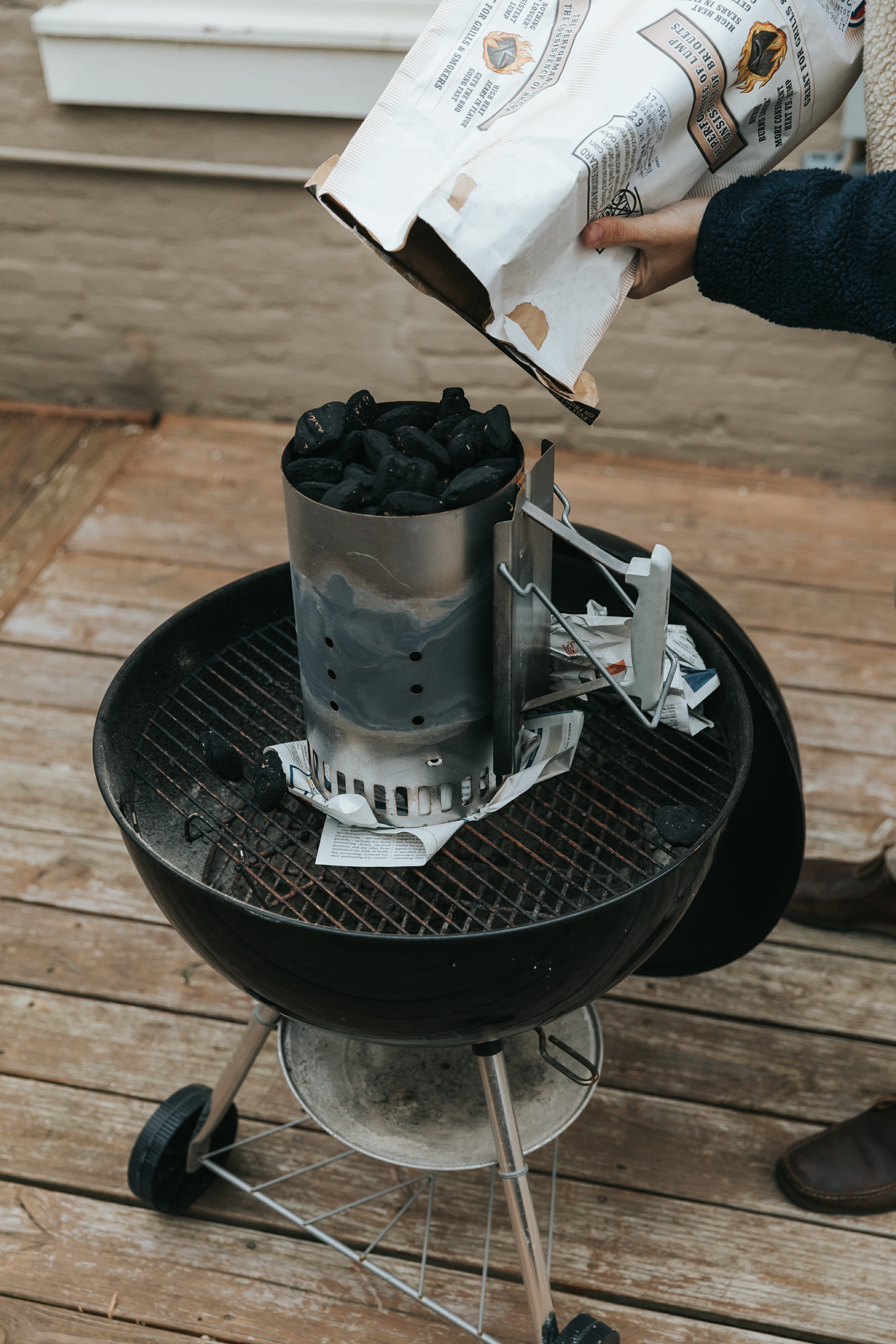 man preparing grill