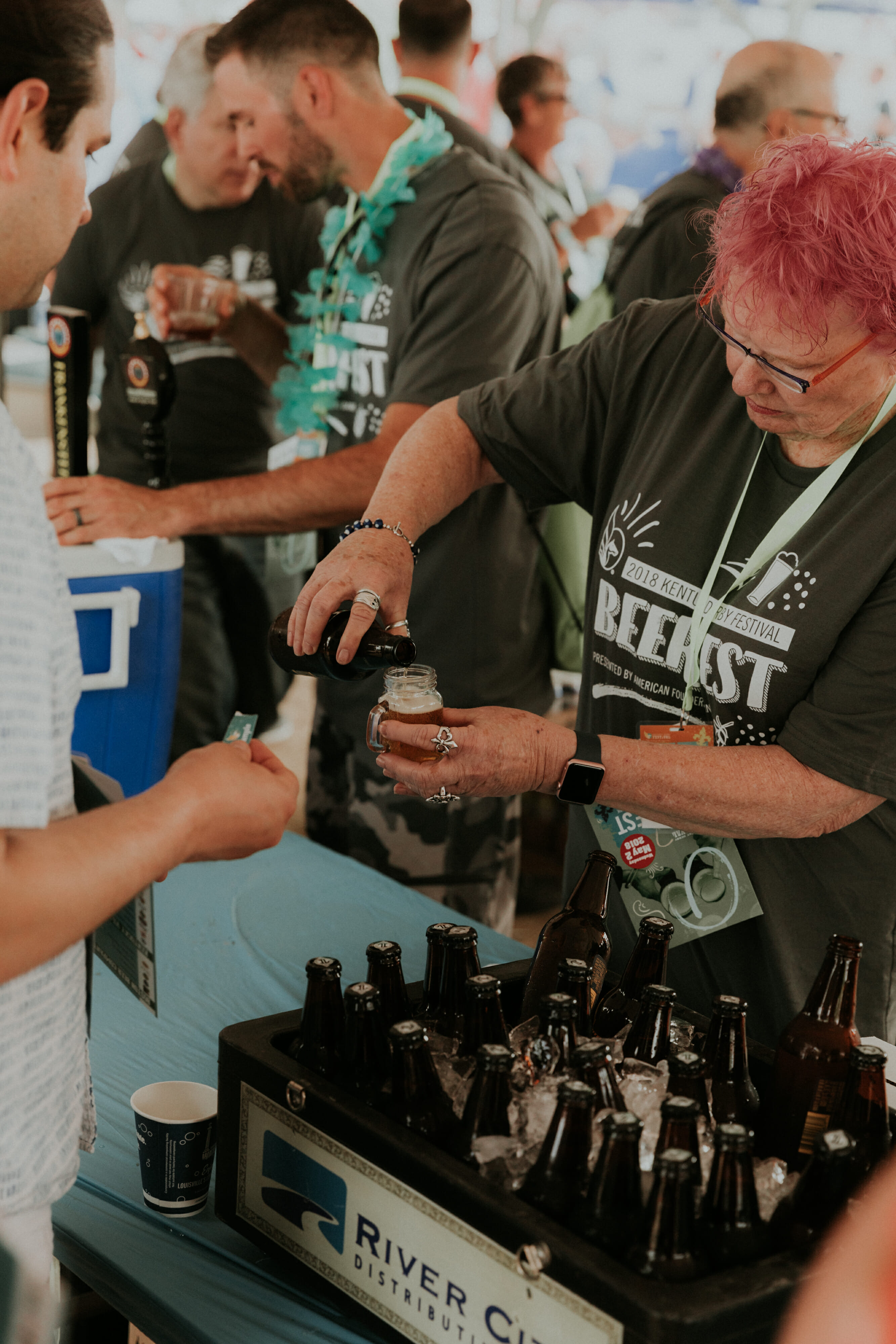 woman pouring beer