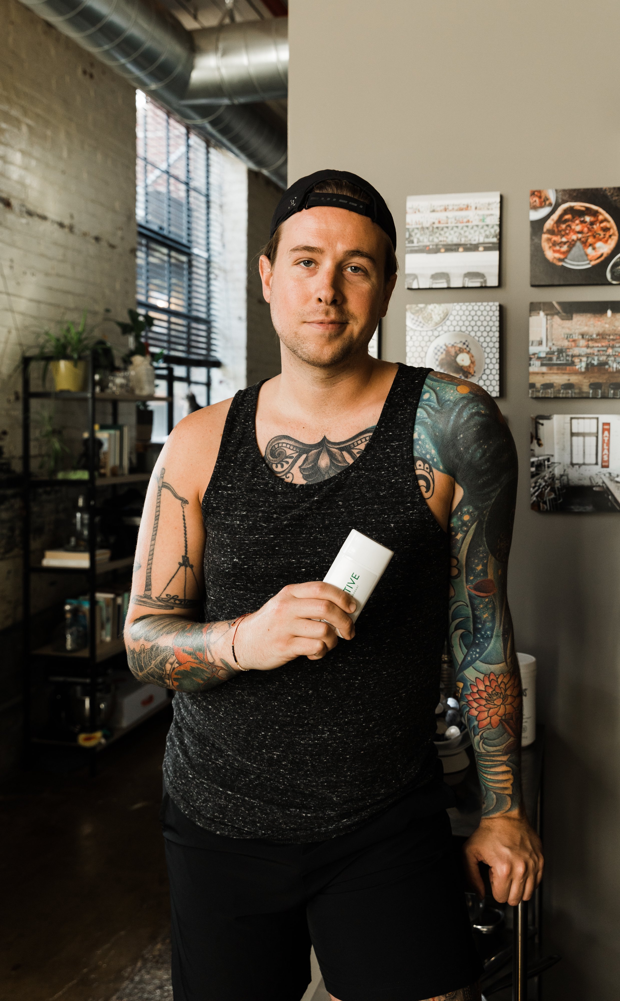 man holding native deodorant