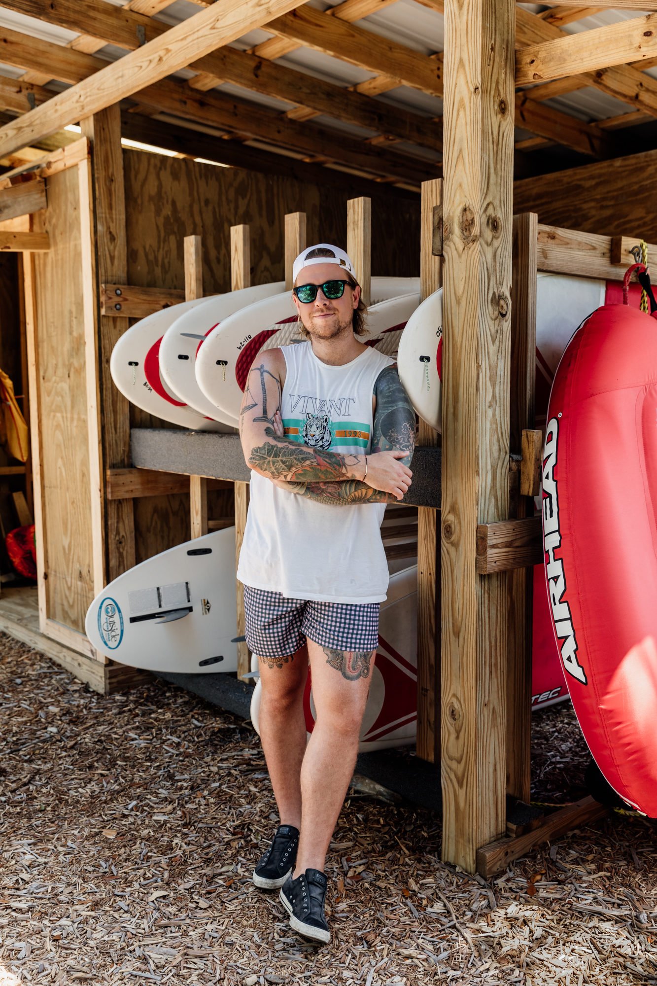 man with paddle boards